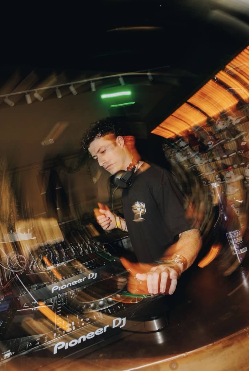 HUGEL mid-set on the Pioneer rig, motion blurred