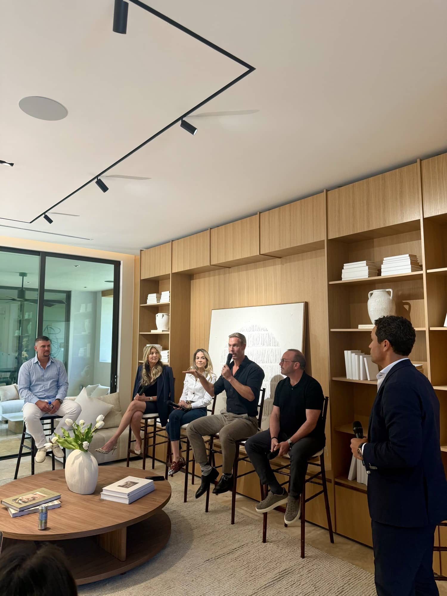 Panel conversation mic'd in a private living room